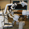 Photograph of mobile C-arm fluoroscopes, retrofitted for high-speed imaging. New 30-cm image intensifiers have been installed and the original cameras have been replaced with high-speed video cameras. Radiological Imaging Services, Hamburg PA (800-748-2040) has experience refurbishing and retrofitting C-arms for high-speed imaging.